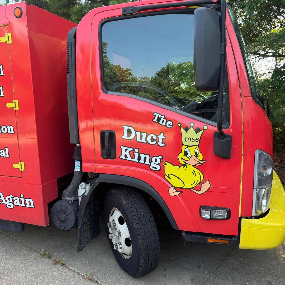 Bennett Furnace & Duct Cleaning red service truck in Urbana, IL